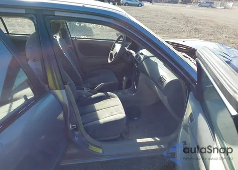 1998 Toyota Corolla Le from USA, damaged, VIN 2T1BR18E9WC033517